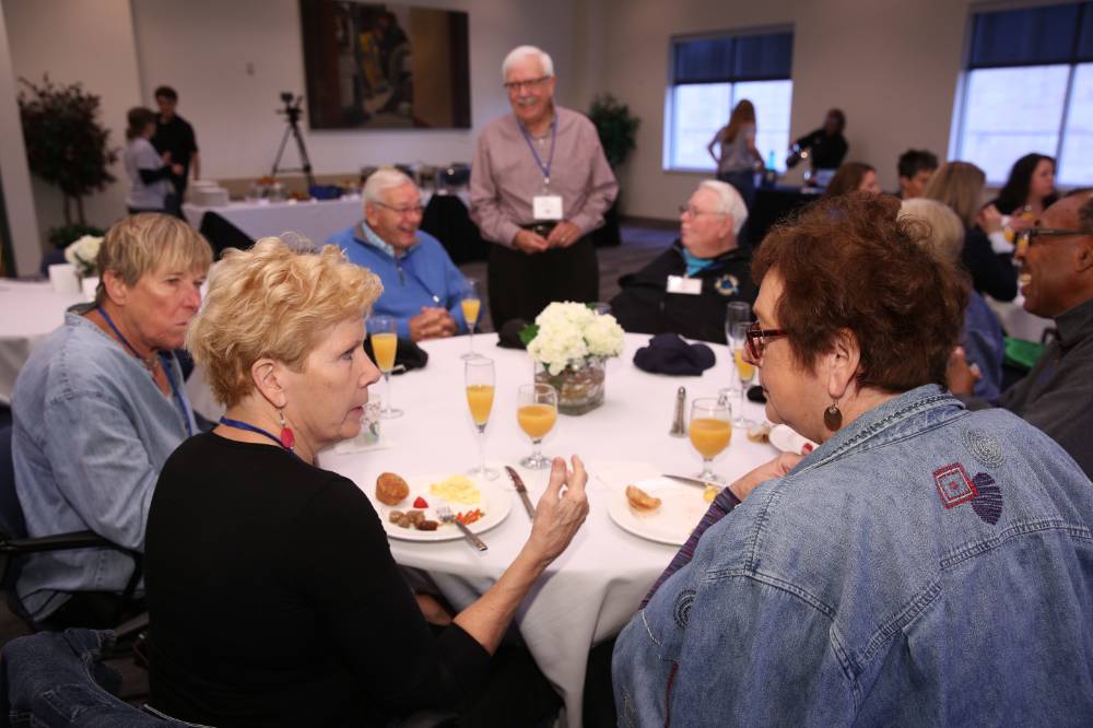 An overview photo of the class of '68 enjoying their brunch at the Alumni Brunch.